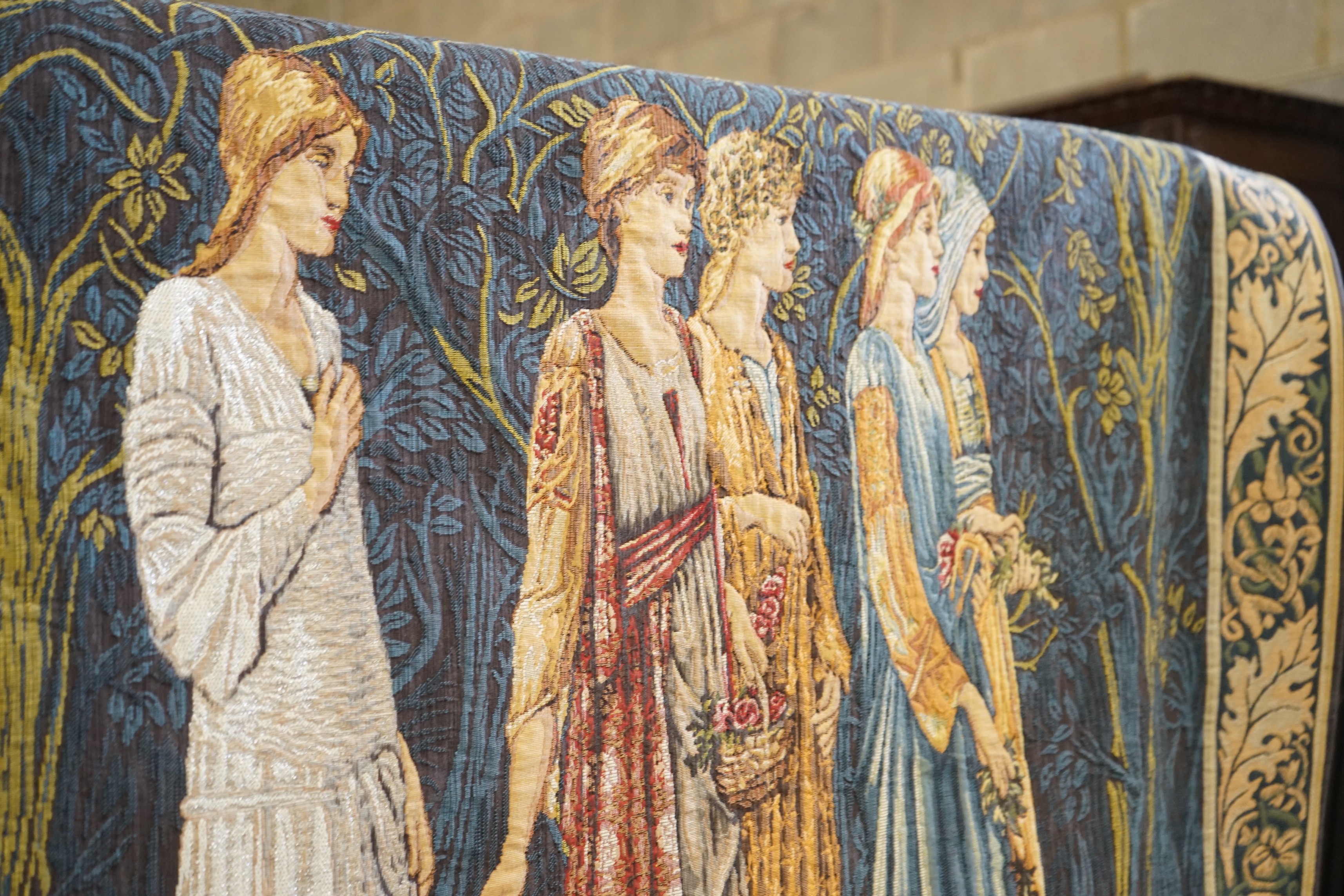 A Hines of Oxford after Burne-Jones a polychrome tapestry panel “Nuptial Procession”, width 188cm, height 122cm